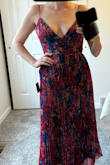 The dress is beautiful, but the straps are so thin and unsupportive. If they are tight enough to keep my breasts from falling out, they dig into my shoulders. Would be fine for standing, but walking or dancing could be an exposure problem. Returning. - Erica H.
