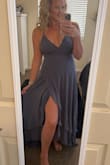 This dress is so beautiful! I have been searching for months for the perfect dress at an affordable price. The color was so unique and I loved the style of the dress I couldn't believe it was only 50$. The sizing is definitely true to size and I loved that the straps were adjustable. It's so flattering, and the slit makes it very sexy! I feel confident wearing this! - Lorainne R.