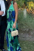 I absolutely loved this dress! It was perfect for a formal wedding in a beach town. The colors were stunning and the dress was so comfortable. The only thing to be aware of is the length of the dress! I am 5'9 and it was long on me. Overall, I am so happy with my purchase and will be wearing this dress again! - Sarah P.