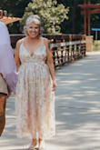 This dress was everything I wanted it to be for my informal second wedding. I didn't want to wear white, but I wanted it to be special, and this dress certainly fit the bill. I got so many compliments throughout the night and I absolutely love how it looks in pictures! 10/10 would purchase again! It is snug at the rib cage, so if that's an issue, you may want to size up, but otherwise, it fits true to size. - Tess D.