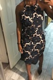 I did not fall in love with this dress like I originally thought I would. The lace part was too much and the under slip didn't look well on my skin tone. I would recommend this dress for a holiday party though. Give it a try! - Nicole E.