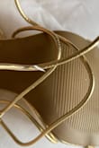 Shoes run a little big. The straps are peeled and the color coating has come off in many areas of the straps. Ordered these shoes and a dress for a wedding and both items arrived damaged. - Yolanda V.
