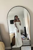 This dress is perfect for my wedding! It is a bit tight on the arms where the lace is, but I can tolerate it for the short amount of time I will be wearing it. Very good material and came on time when it was supposed to. 10/10 get this dress! - Sierra B.