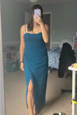 I'm in between sizes for a M/L but the M fit perfectly! There is some stretch to the fabric and the ruching is very flattering to cover your stomach. The cups are on the smaller side but I feel comfortable to wear the dress without needing a bra for support. Can't wait to wear it at my friend's wedding next month! - Hyebina P.