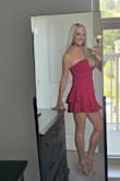 This dress fits like a glove! It's strapless but stays perfectly in place. It runs a bit short but I prefer that look! - Tina M.