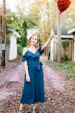 The fabric of this denim jumpsuit is not actual denim, which makes it a nice, lightweight find to wear in the hot summertime! I ordered a size S because I have a tiny frame and it fit beautifully. I wore it recently for a fun birthday photoshoot and I absolutely adore how flowy the pants are! A must-have for spring if you want something trendy yet affordable. - Amanda B.