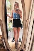 I usually wear an XS in Lulus but it was too small. I had to order a small and it fit perfectly. I wore it to a country concert. I was very comfortable and I received many compliments! It's very versatile. I will definitely wear again with other outfits. - Kellie C.
