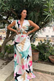 Purchased this for my trip to Spain. Received so many compliments. I purchased a Medium; the top was perfect for any bust size; the skirt is double lined and fits perfectly, especially on a small waist and larger hips! - Arta S.