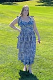I originally ordered a large since my body fit will either be large or XL. Could not get the large zippered so ordered an XL. The issue I had was the bust. When I got the XL there was so much extra space in the breast area and a large gap when I bent over. The back of this dress doesn't allow for a normal strapless bra. I won't be wearing this dress again. Where the size given was in between the L & XL was not beneficial. - Amanda P.