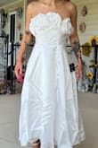 Sub par. For 80 bucks I was expecting a much better fit. It fit like a box and such cheap material. I feel like Lulus has really gone down hill with the quality. Roses are much more spaced out, my MIL said it looks like a towel wrapped around me. - Hannah K.