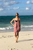 I wear this dress typically as a swimsuit cover up to the beach. Super easy to throw on and go. I've also worn it with a cute bralette and went to lunch a few times. If you are wanting the dress to be more fitted then I would suggest ordering a size smaller than you usually wear. But i wear it loose and it's super comfortable, especially on days it's really hot out. - Nancy E.
