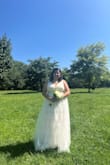 I love this dress. It's lovely, gorgeous and simple. It hug my breast. It didn't make me seem or feel pregnant. I got it two days after I ordered it. This dress I wanted to use for my reception but I never got the one I wanted to wear but I'm not disappointed that I wore this beautiful dress for my wedding. Thank you so much! Please keep making more beautiful dresses and making women feel gorgeous on their special day! - Jeniffer R.