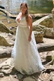 Beautiful, flattering for someone with a stomach, revealing yet classy, floaty and natural.
FYI I'm only 5'0 tall so this dress was super low and long on me, but I didn't mind. I made zero alterations. - April S.