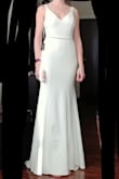 Dress is gorgeous but unfortunately 2 inches too short in the front for me (I'm 5'9). The fabric is quite thick but I'd still wear shape wear underneath because it shows every tiny roll... I sent it back and went with a different dress from lulu's. - Andrea M.