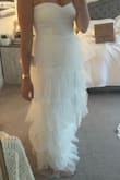 This dress is adorable and fun! Runs small so I recommend ordering 2 sizes larger than you typically are. The dress is also really long and I am 5'10 so will need it altered. - Emma E.