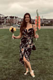 I really love this dress. It's so cute and can be styled up for an event or dressed down for a casual summer day. I did have to order a size up as it was tight on my chest, but the size up fits very well. I am happy to own this dress and can't wait to wear it when I have my next concert! - Claudia V.