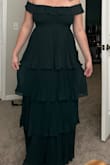I absolutely love this dress I got a size large and it's just a little bit big but a medium would've been too small. It's very nicely made. I am planning to wear to a wedding and I think it'll be perfect. It's also perfect length and I'm 5'9 - Kaelyn V.