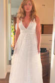 I was excited to try this dress but skeptical it would look anything like the photos considering the price was so reasonable. But upon receiving it, it was just gorgeous and absolutely made me feel like a princess. It is quite low-cut and revealing in the front if you have a larger chest, but if you're willing to go for it, it does hold you in quite nicely. I'm wearing this to renew our vows so could go a little more risqué. It's quite comfortable and you absolutely feel like a princess. - Jennifer F.