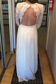 I love this dress - it fits really nicely, a little loose in the waist but it'll be perfect for sitting! The length and overall fit is great! I have yet to formally wear it, as I have purchased it for my summer wedding! It will look beautiful and tie in perfectly with our backyard garden theme! Thank you for contributing to one of the happiest days of my life! I can't wait to show my future husband - I think he'll agree with me! - Kayla S.