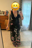 This was so beautiful. It hung nicely and wasn't very heavy despite the elaborate flowers. I will need to make the straps shorter but it fits my hourglass shape in a flattering way. - April D.