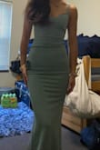 I ordered this dress last minute for a wedding as a guest and it's really cute! There was only one size left (xxs), which is why it was a bit tight on the bust. I think if I got my regular size (xs), it would fit much better in the bust area. The only thing about this dress for me was the bit of extra fabric at the waist. - Amanda L.