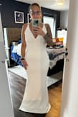 I literally tried on 18 dresses and finally just settled on one due to frustration. I looked on Lulus and ordered 2 dresses just to give it one last shot. The moment I put this dress on I knew it was it!! It fits perfectly, well almost I am not very big in the chest area so it's a little big there but nothing a good seamstress can't fix. I am having an intimate backyard wedding and wanted something simple but sexy and this checks both boxes! I am so glad I took the chance and the best part was it was under $100! - Jenn R.