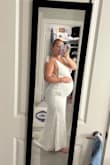 I am 7 1/2 months pregnant and this dress is perfect for my elopement. I know it's not listed as a maternity, but I looked at the reviews and was pleased with my purchase. The fabric has just enough stretch for my belly! - Gabriela M.