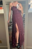 The dress fit very well (maybe a tiny bit tight in the bust but I have 32F bra size). But the dress looks much more red online than in person. In reality, it's more of a plum or a berry, definitely more purple than pictured. It's a good quality dress (well made, nice appliques) but really not the same color as advertised. I'd recommend it as long as you like the color plum/berry purple. If you're looking for something red, you'll need another option. 

TLDR: good quality dress, much more purple than pictured. - Syd L.