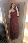 I picked this as my "safe" fallback, and it ended up being a little too safe for me! It was very pretty but felt a little plain and bridesmaids-y. The fabric also felt a little cheap and plastic-y. However, it flattered my figure and I didn't have any concerns about coverage! - Zainab L.