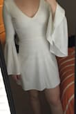 Unfortunately the length is Way too short. ESP in the back. I wish LuLus would add length to ALL this dresses and girls and hem when appropriate rather than making all short dresses. Everything else fit and the sleeves were gorgeous. Wish i could where it to my rehearsal dinner. - Hannah E.