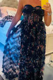 This dress is gorgeous but did not fit around my chest. It was too large. - Lauren J.