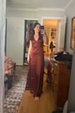 I bought this as a bridesmaid dress and I am so in love with it! The quality is great, it feels much more expensive than it is. Fits true to size, maybe a teeny bit long but works great with heels. - Ava P.