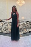The fit of this dress was absolutely perfect. It felt snug in all the right places. I especially loved how flowy the bottom part the dress was. - Ashley R.