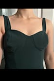The dress is super cute except for the bust! They are weirdly large and pointy and I couldn't make it look normal regardless of the bras I tried and couldn't fill out the top even with two bras. I ordered an xs and it fit great everywhere except for the chest so that was really disappointing. I guess this would probably work better with someone with a larger chest. - Ally T.
