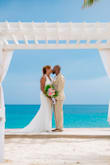 Love, love, love this dress! It fit perfectly! Very comfortable and not too heavy for my beachside/cruise wedding! I did have alterations in order to attach the lacy sheath and silk liner down the long split to keep them from separating as I walked. But other than that, it was PERFECT! - Sonia D.