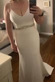 Tried on so many dresses but this one was it. It looked better than the $1,200 dresses to me. My made of honor found the perfect belt for it to add and will be wearing a cathedral veil with my hair down. - Michelle T.