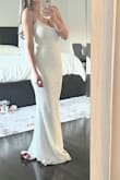 It was my wedding dress and it was perfect! All I did was add boob cups with the seamstress and a bustle. No hem needed with heels. I wish I could wear it again and again! Ignore the flower petals stuck to the bottom lol - Mary A.