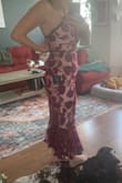 I am 5'9, 157lbs and a 34C/32D and the breast part of this dress is still big. It's very baggy around the armpits, but it does look better if you use sticky tape to tape the sides down. I wanted the blue color of this dress, but they were sold out in my size so I got the red. I don't know if that's why it looks more like lingerie than the blue color would, but it's just a little too risky for me. The zipper zips up and the dress around the waist where the stitching is is also very small and tight compared to the bust which is overly big. May be a good cocktail hour dress if anything, but not a wedding guest dress - Cassidy M.