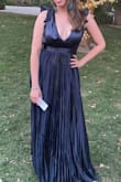 Could not be any happier with the purchase. I love this dress and it was perfect for my event. Also perfect for dancing. - Dahiangi H.