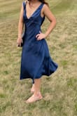 Beautiful color and material. Fit great but maybe a little big in the bust/shoulders. Might consider getting it altered before wearing it again, but overall I'm pleased with it and got tons of compliments - Olivia N.
