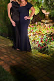 A perfect blend of classy and sexy. Very flattering. Wore it to a black tie wedding and the dress was perfect for it but unfortunately, maybe a little too perfect- Three other girls had the same exact dress on. So that was annoying. - Sabrina C.