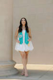 I purchased this dress for graduation photos and to say I'm obsessed was an understatement! The perfect length and shape! - Noel A.
