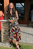 I wore this dress as a wedding guest and got compliments on it from nearly everyone! I ordered a small XS and ended up returning the small since it was a bit too big in the chest/ribs area. The XS fit perfectly and was super flattering. Quality was good - I did need to iron down a few of the flowers so due to getting creased in shipping, but no big deal. 10/10! - Esma T.