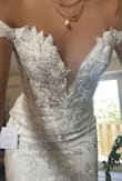 Originally, I had ordered two other dresses from Lulus. They both fit well and were very pretty, but I wasn't sure if they were "the one". I ordered this dress as a third option to try on. The second I put this dress on, I was smiling so hard. I knew it was exactly what I had been looking for. Fits like a glove. Even went to a tailor and asked if there was anything they thought would need to be done and they said "honestly, no". The quality is great. The fabric is beautiful and I'm in love. I don't want to post too many pictures since I haven't gotten married yet and I don't want to give anything away. but 10/10 dress from Lulus. As far as returning the other two, super easy and simple process. Got my refund within a week or so from them. I cannot believe I found a wedding dress that looks as gorgeous as this for a reasonable price! Highly recommend. - Theresa M.