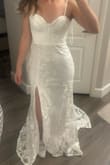 I tried on so many Lulus dresses and ended up choosing this one. There was no need for any alterations since the straps are adjustable. The dress is super comfortable and doesn't feel cheap. - Geily F.