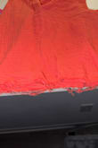 Unfortunately, the bottom of the top frayed. I don't think it should be this way.  Extremely sad.  I understand I purchased it as a final sale but I would have never thought it would fall apart.  Strings are hanging down. - Kim S.