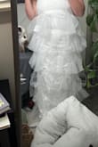this was probably one of the most tragic dresses I've ever tried on. I somehow look like the michelin man, that one IKEA lamp everyone had in their first apartment, a paper lamp, and also a caterpillar?? I don't know, but it's the worst dress I could have possibly bought. 0/10 - Gabrielle L.