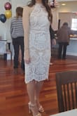 I purchased this dress back in March 2020 for my bridal shower. It was stunning and I received so many compliments. Great high quality material, lined well- a bit thicker. There is no give or stretch to the dress, so beware! I carry my weight in my bottom/thighs so it was a bit snug on the bottom. Unfortunately, my shower was in March and I was pretty pale. A few people made comments that the nude color lining matched my skin and looked like I was just wearing a see through lace dress. Insert eyeroll. - Ashley H.