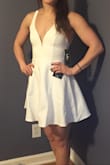 I love this dress and will wear it for my bachelorette party! The only thing that was kinda a down fall is that it too tight around my rib cage under my breasts. Then again if you are a weight lifter, I would get the next size bigger to feel a little more comfortable. And also I would add an eye- hook to the top of the zipper! - Lea B.