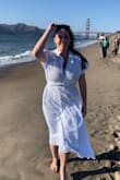 Absolutely love this dress! I have it in the blue/white stripe and just bought it in black because I love it so much. I have a larger chest so I typically struggle to find a flattering and comfortable fit. This dress does both! I can wear a regular bra for support. The tie in the back is large & cute! Will buy in more colors if it becomes available! One of my favorite purchases thus far. - KK W.